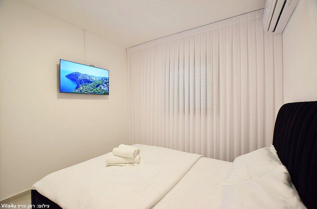 אביטן ריזורט - מיטה זוגית עם מצעים